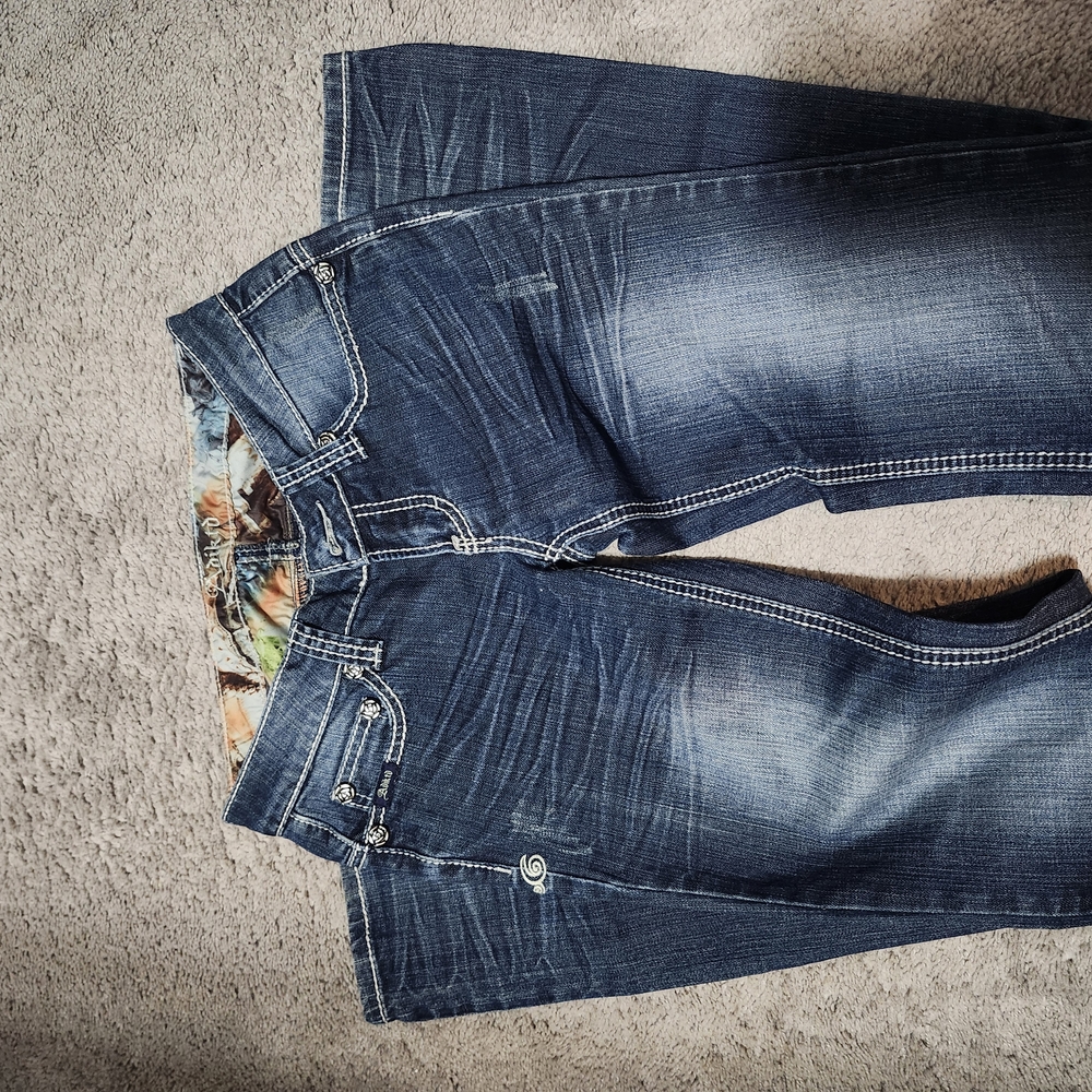 Blue Boot Cut Jeans with Distressed Look